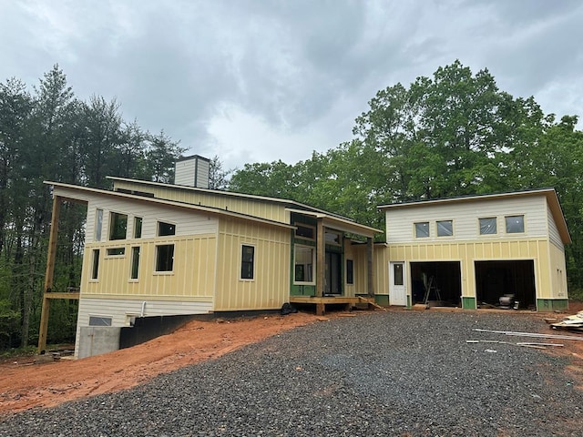 LOT22 Fairview Dr, Morganton, GA 30560 - view of front of property featuring a chimney, board and batten siding, an outbuilding, and driveway