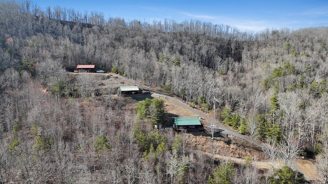 aerial view featuring a view of trees