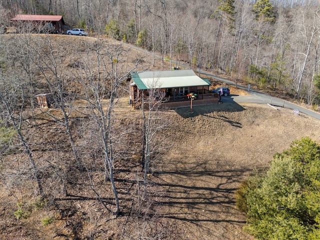 aerial view featuring a view of trees