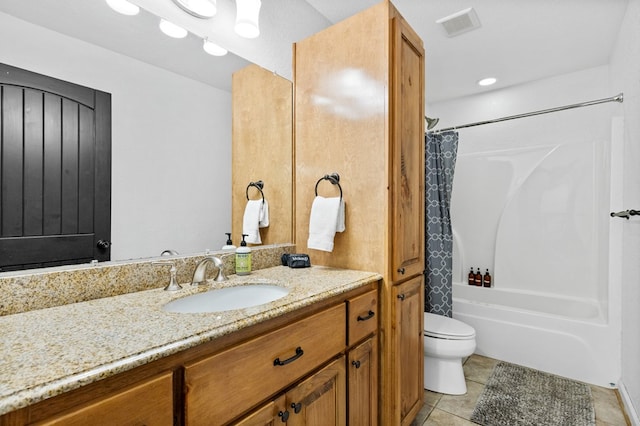 full bathroom featuring shower / bathtub combination with curtain, tile patterned flooring, vanity, and toilet