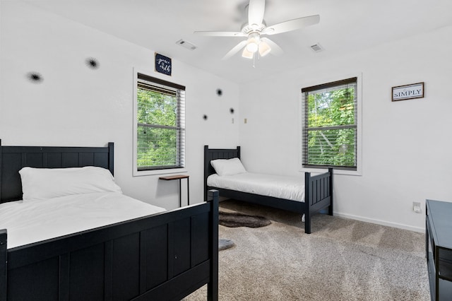 bedroom featuring carpet floors and ceiling fan