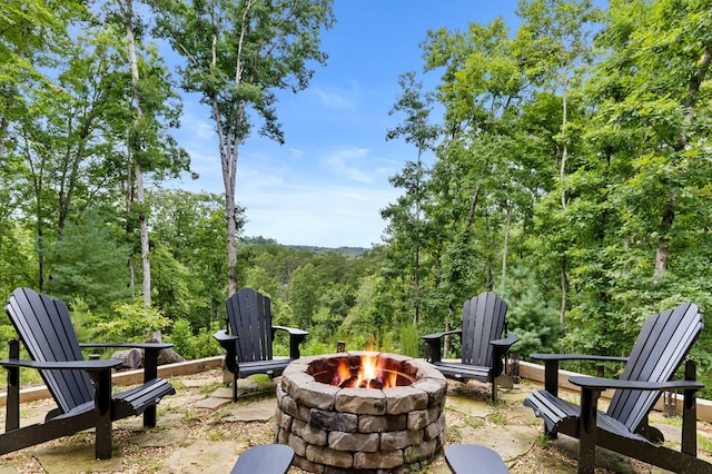 view of patio / terrace featuring a fire pit