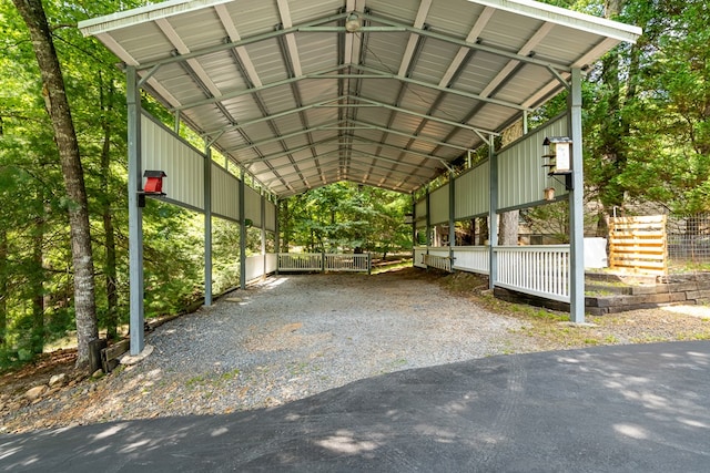 view of parking with a carport and driveway