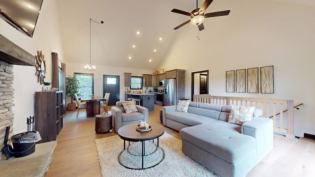 162 Barefoot Trl, Blairsville, GA 30512 - living area featuring high vaulted ceiling, light wood-style floors, a ceiling fan, recessed lighting, and a chandelier