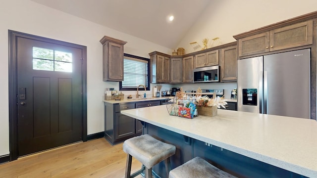 162 Barefoot Trl, Blairsville, GA 30512 - kitchen featuring stainless steel appliances, light countertops, a breakfast bar, a sink, and recessed lighting