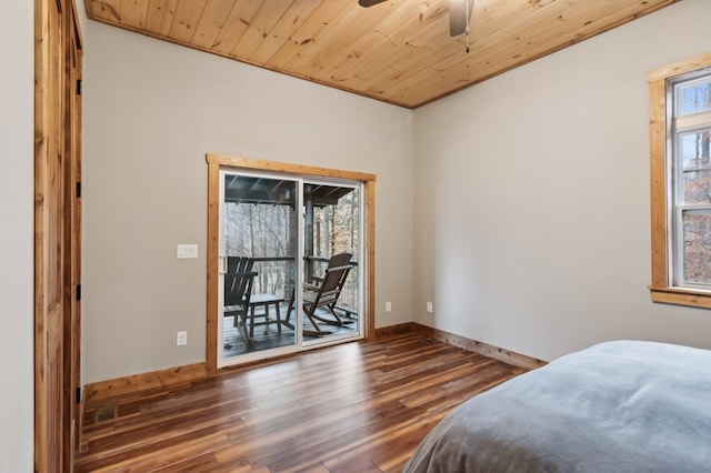 bedroom with wooden ceiling, dark wood-style flooring, visible vents, baseboards, and access to exterior