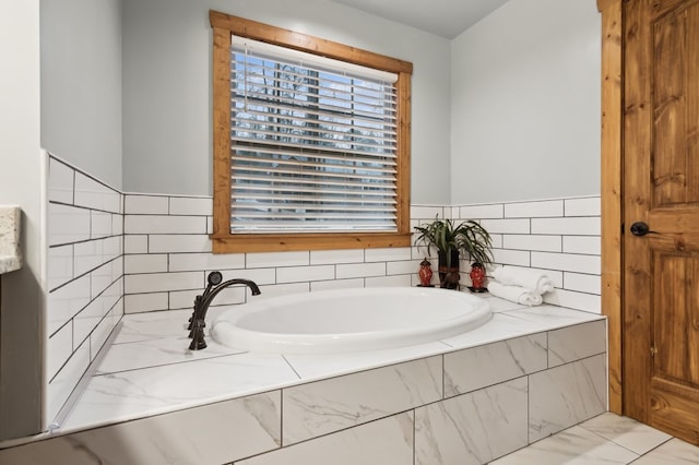 bathroom featuring a bath