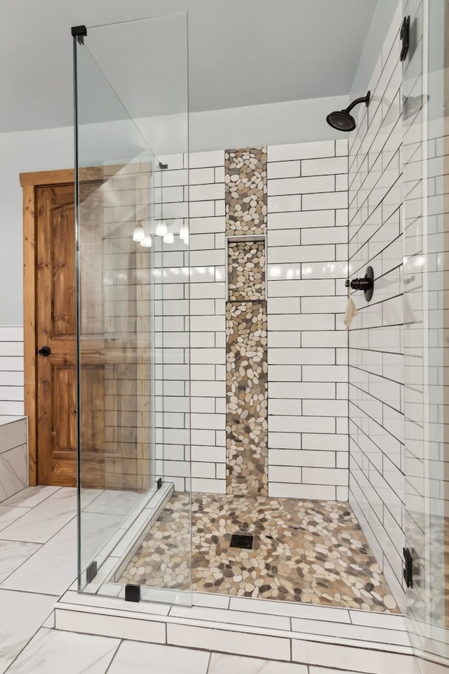 bathroom featuring a shower stall