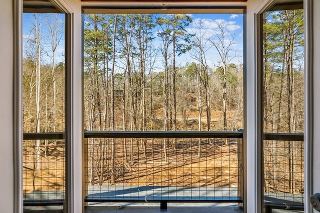 interior space featuring a forest view