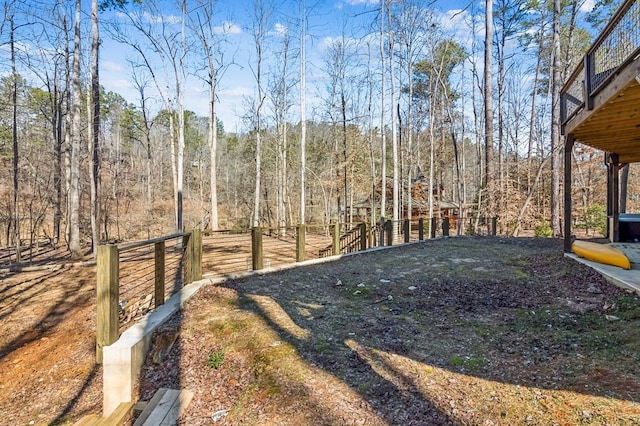 view of yard with a wooded view