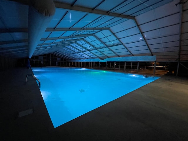 indoor pool with glass enclosure