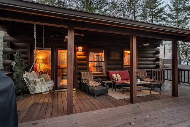 deck with an outdoor hangout area