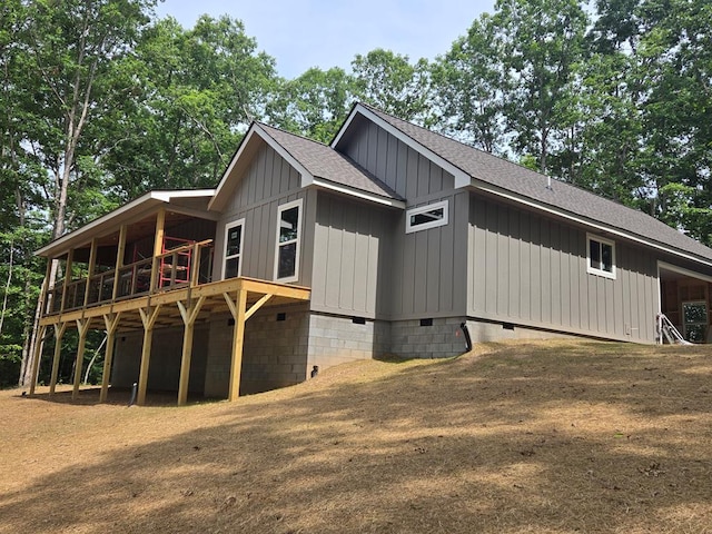 31 Small St, Blairsville, GA 30512 - back of property featuring crawl space, roof with shingles, board and batten siding, and a deck