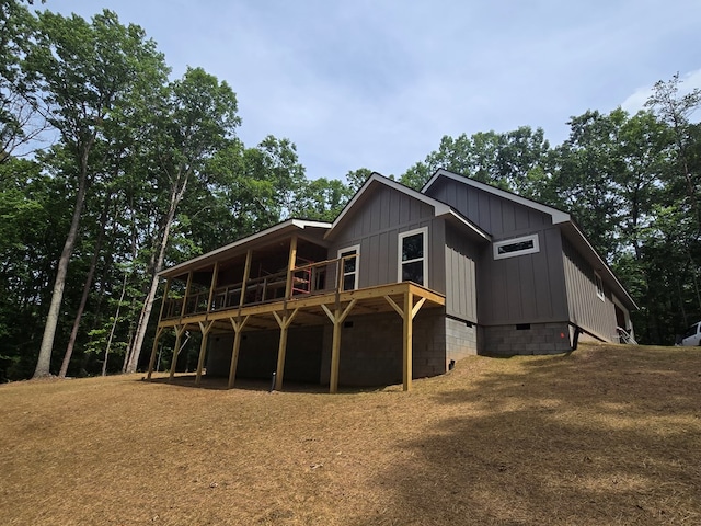 31 Small St, Blairsville, GA 30512 - back of property featuring a wooden deck and board and batten siding
