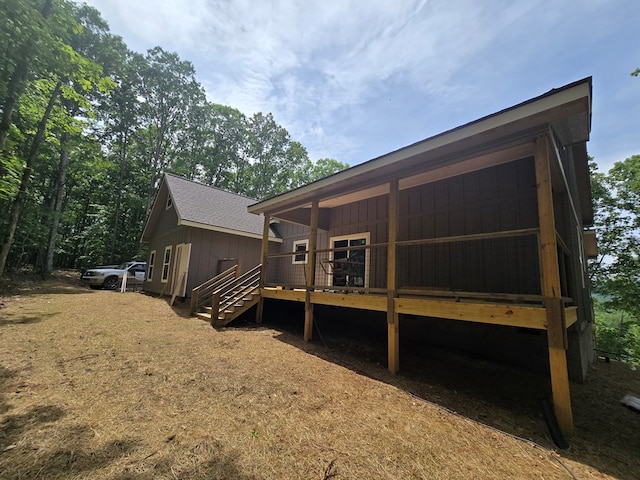 31 Small St, Blairsville, GA 30512 - rear view of property featuring a wooden deck and board and batten siding