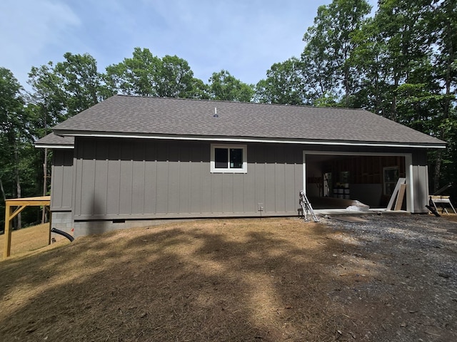 31 Small St, Blairsville, GA 30512 - view of side of property featuring a shingled roof, a garage, and crawl space