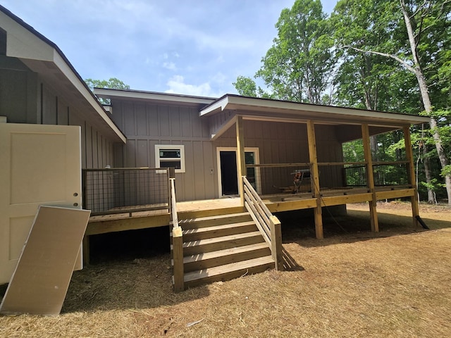 31 Small St, Blairsville, GA 30512 - back of property with a wooden deck and board and batten siding