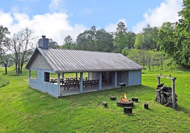 31 Small St, Blairsville, GA 30512 - view of community with an outdoor fire pit, a yard, and a patio area