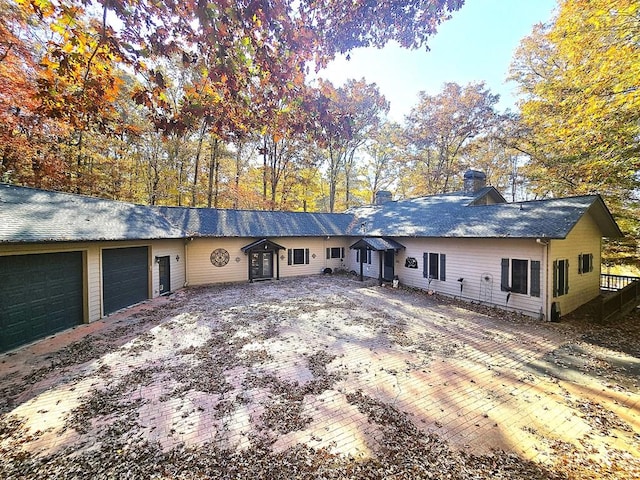 ranch-style home with a garage