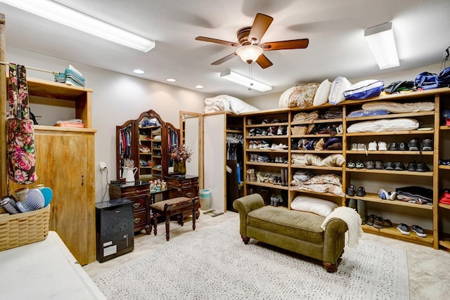 interior space featuring ceiling fan