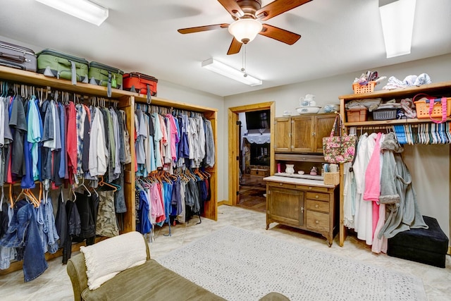 spacious closet featuring a ceiling fan