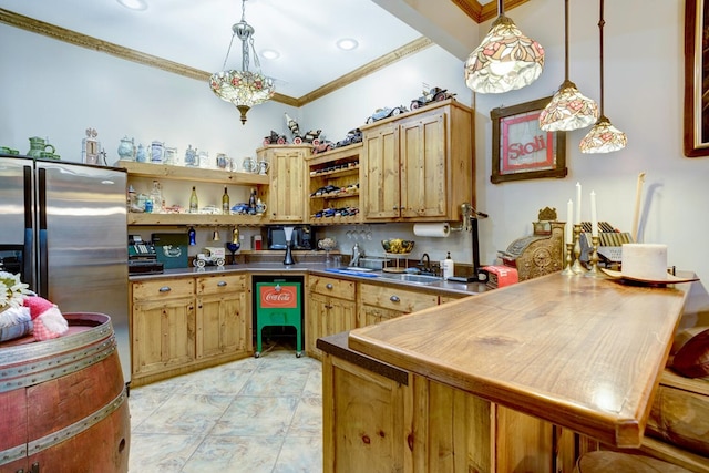 kitchen with dark countertops, ornamental molding, open shelves, and decorative light fixtures