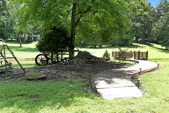 view of community featuring a yard