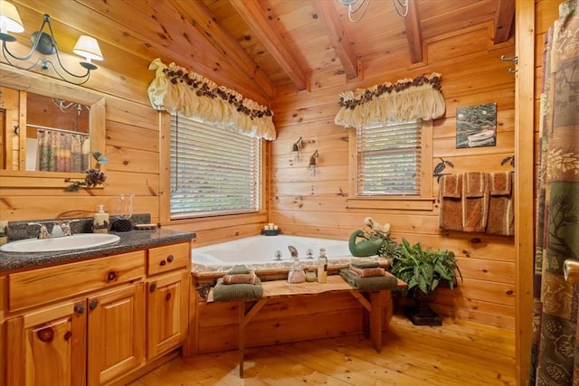 bathroom featuring wooden ceiling, hardwood / wood-style floors, wood walls, vanity, and plus walk in shower