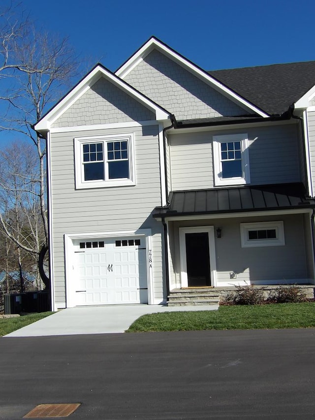 view of front of home with a garage