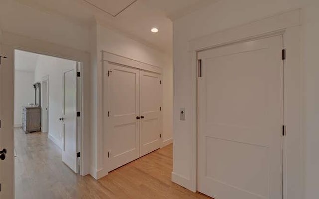 hall with light hardwood / wood-style flooring