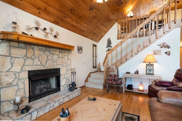 1595 Country Walk, Murphy, NC 28906 - living room featuring stairway, wooden ceiling, wood finished floors, a fireplace, and baseboards