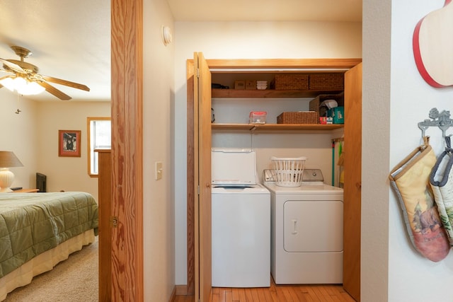 1595 Country Walk, Murphy, NC 28906 - laundry area featuring washing machine and clothes dryer, a ceiling fan, and light wood-type flooring