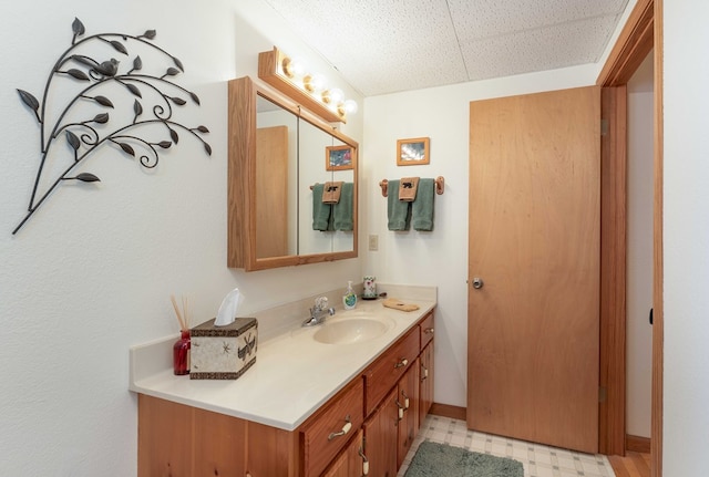 1595 Country Walk, Murphy, NC 28906 - bathroom featuring tile patterned floors, vanity, a paneled ceiling, and baseboards