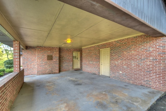 view of patio featuring an attached carport