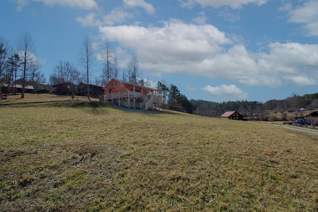 view of yard featuring a deck