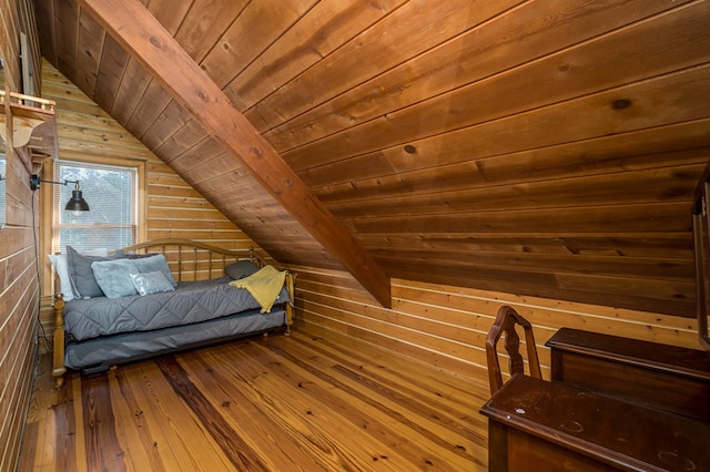 bedroom with hardwood / wood-style flooring, lofted ceiling with beams, wood ceiling, and wood walls