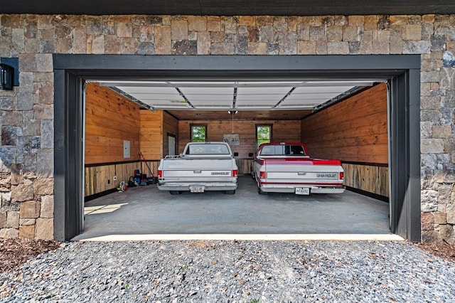 garage featuring a carport