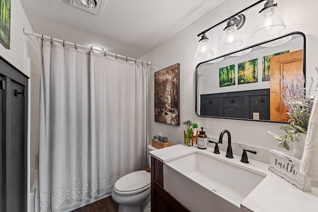 400 Creekside Dr, Mccaysville, GA 30555 - full bathroom featuring toilet, vanity, shower / tub combo, and wood finished floors