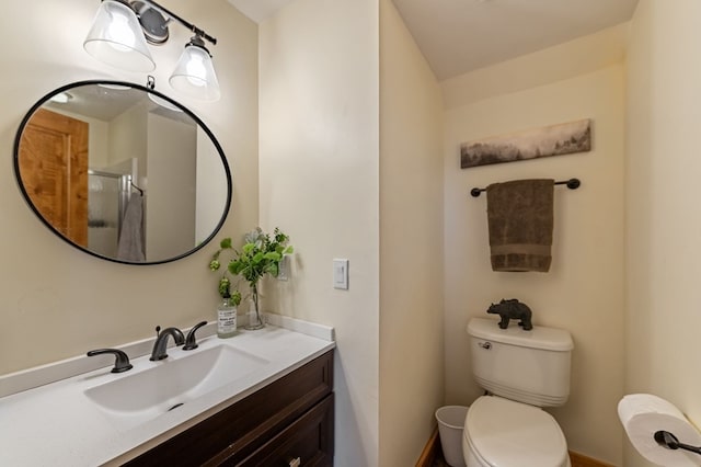 400 Creekside Dr, Mccaysville, GA 30555 - bathroom featuring a stall shower, toilet, vanity, and baseboards