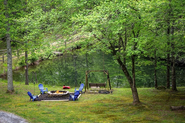 400 Creekside Dr, Mccaysville, GA 30555 - view of grassy yard with an outdoor fire pit