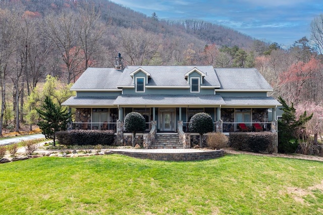 view of front of home with a front yard