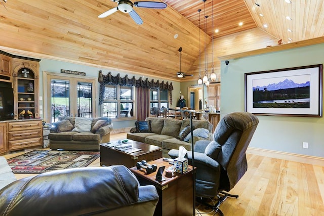 living room featuring light wood-type flooring, ceiling fan, high vaulted ceiling, and wooden ceiling