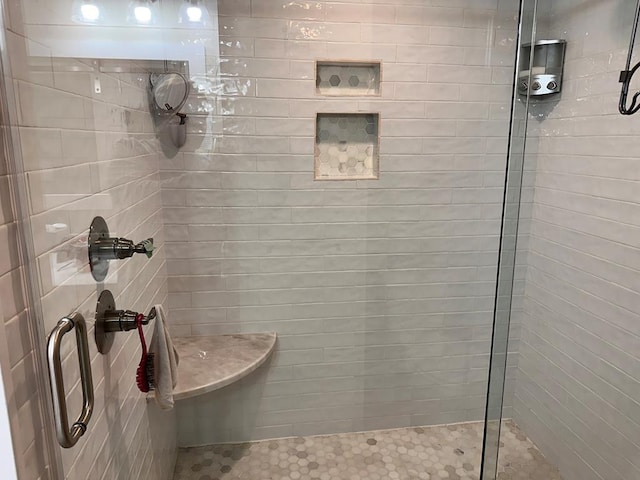 bathroom featuring a stall shower