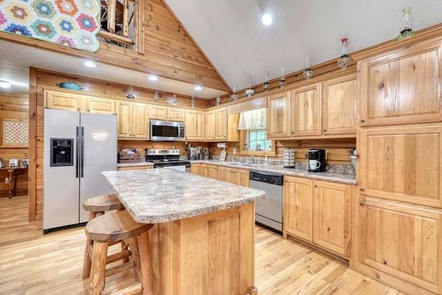 1394 Camp Creek Rd, Murphy, NC 28906 - kitchen with stainless steel appliances, light wood-type flooring, a center island, light brown cabinets, and recessed lighting