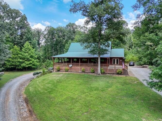 1394 Camp Creek Rd, Murphy, NC 28906 - log-style house with covered porch, asphalt driveway, and a front lawn