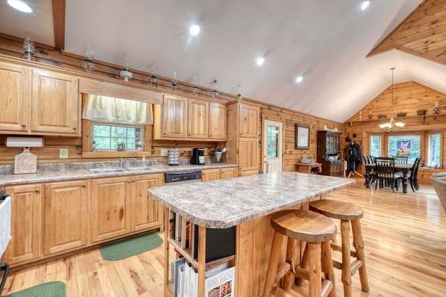 1394 Camp Creek Rd, Murphy, NC 28906 - kitchen featuring lofted ceiling, a sink, plenty of natural light, light wood-style flooring, and a kitchen island