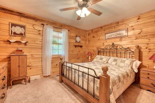 1394 Camp Creek Rd, Murphy, NC 28906 - bedroom featuring light colored carpet, wooden walls, and a ceiling fan