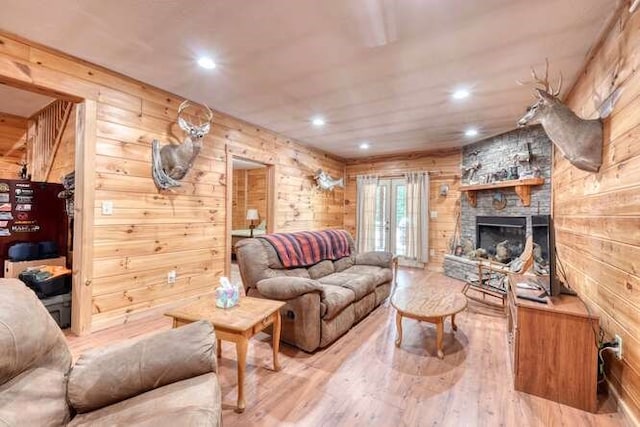 1394 Camp Creek Rd, Murphy, NC 28906 - living room featuring wood walls, light wood finished floors, recessed lighting, and a stone fireplace