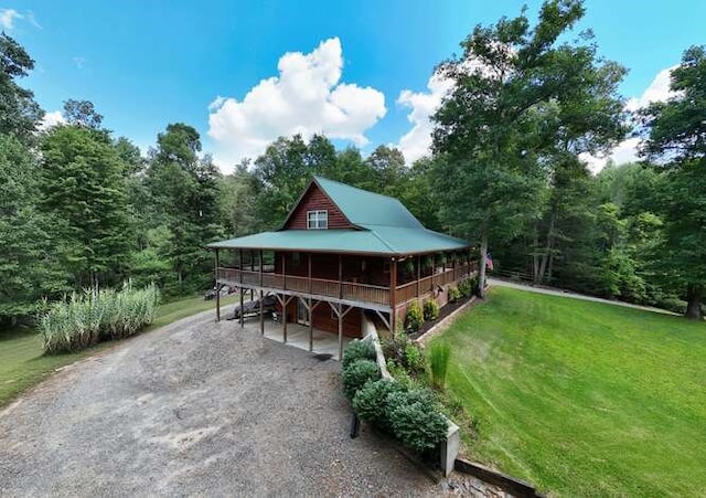 1394 Camp Creek Rd, Murphy, NC 28906 - view of front of property with dirt driveway, a front yard, a carport, a wooden deck, and a forest view