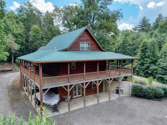 1394 Camp Creek Rd, Murphy, NC 28906 - rear view of property featuring dirt driveway, a patio, french doors, and a deck